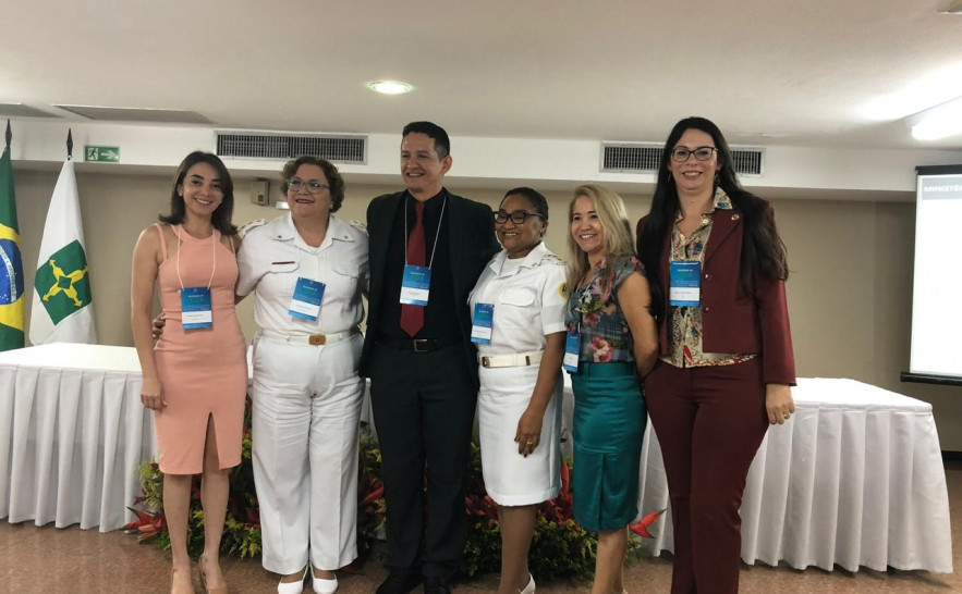 Delegada Ludmila e demais integrantes das forças de segurança durante evento da Senasp em Brasília 