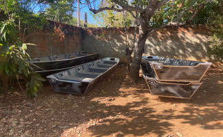 Em Porto Nacional, Polícia Civil apreende barcos e motores avaliados em R$ 150 mil armazenados em casa abandonada